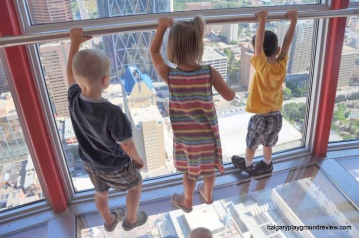 View from the Calgary tower and three kids