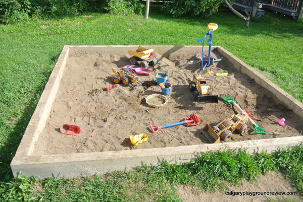 Sandbox with toys