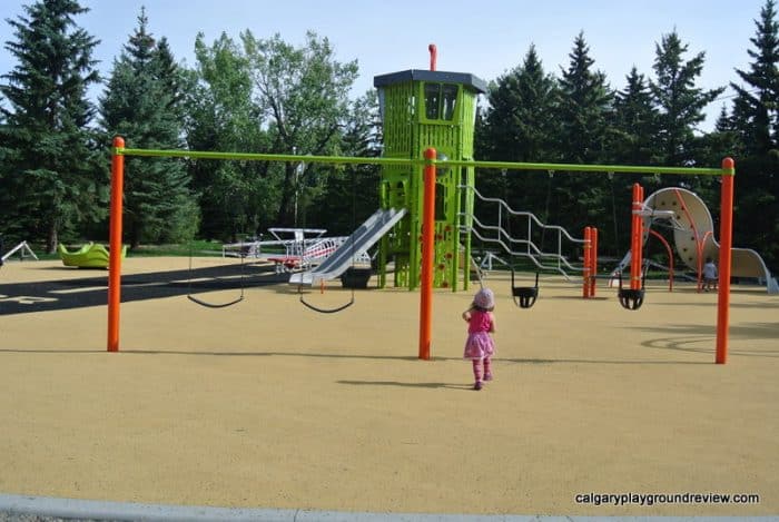 two baby swings, two regular swings - Currie Barracks Airport Playground