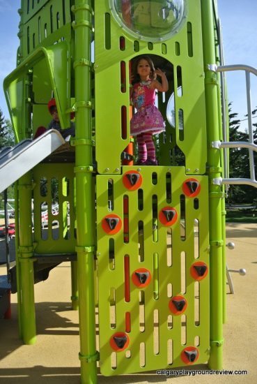 GIrl on green climber