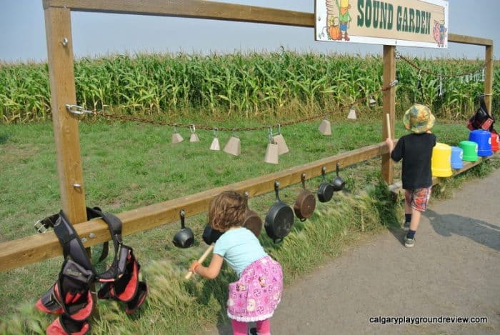 Musical sound garden with bells, pots, pans and buckets