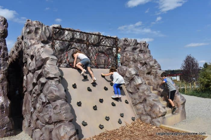 Small climber wall with kids climbing