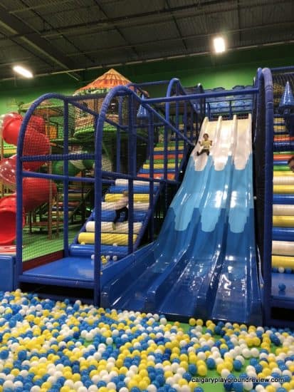 Triple slide into the ball pit at the Big Box