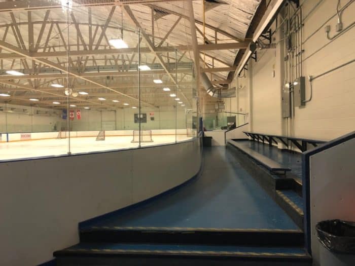seating by the player benches at Rose Kohn hockey rink